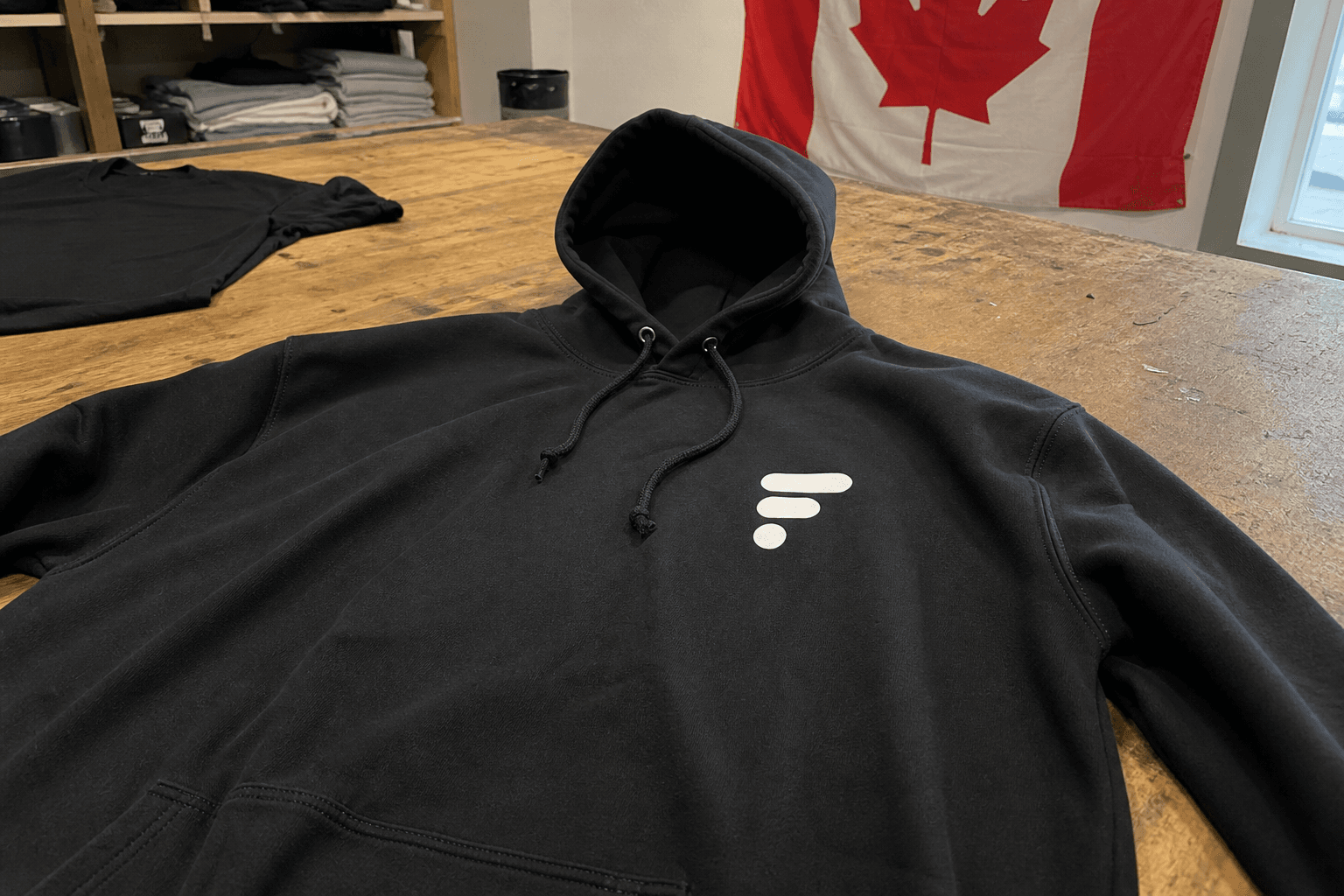 Close-up of custom printed hoodie fabric and stitching